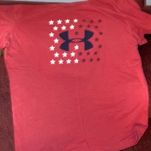 Under around shirt. Red.